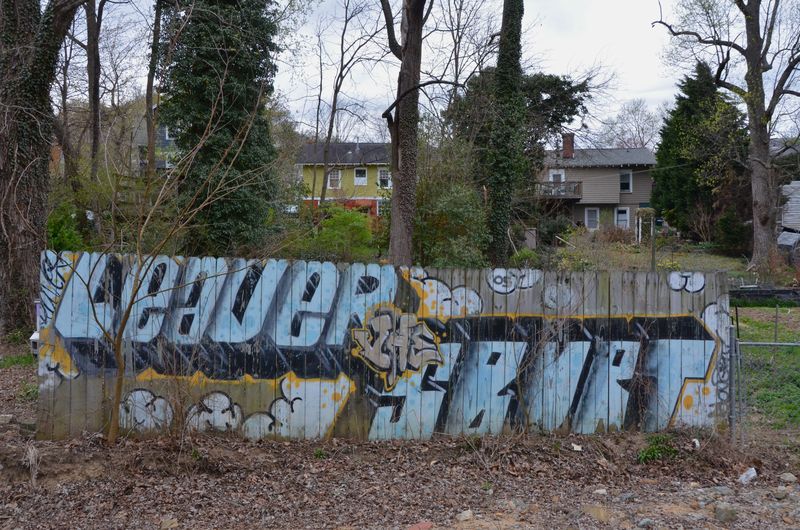 Grafitti, Tagged Fence