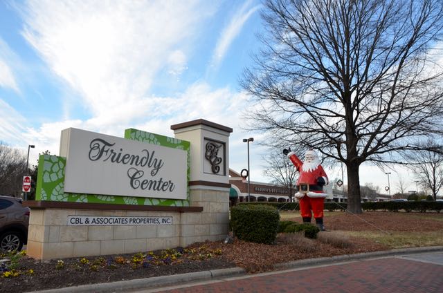 The Friendly Waving Santa on Friendly Avenue at Friendly Center